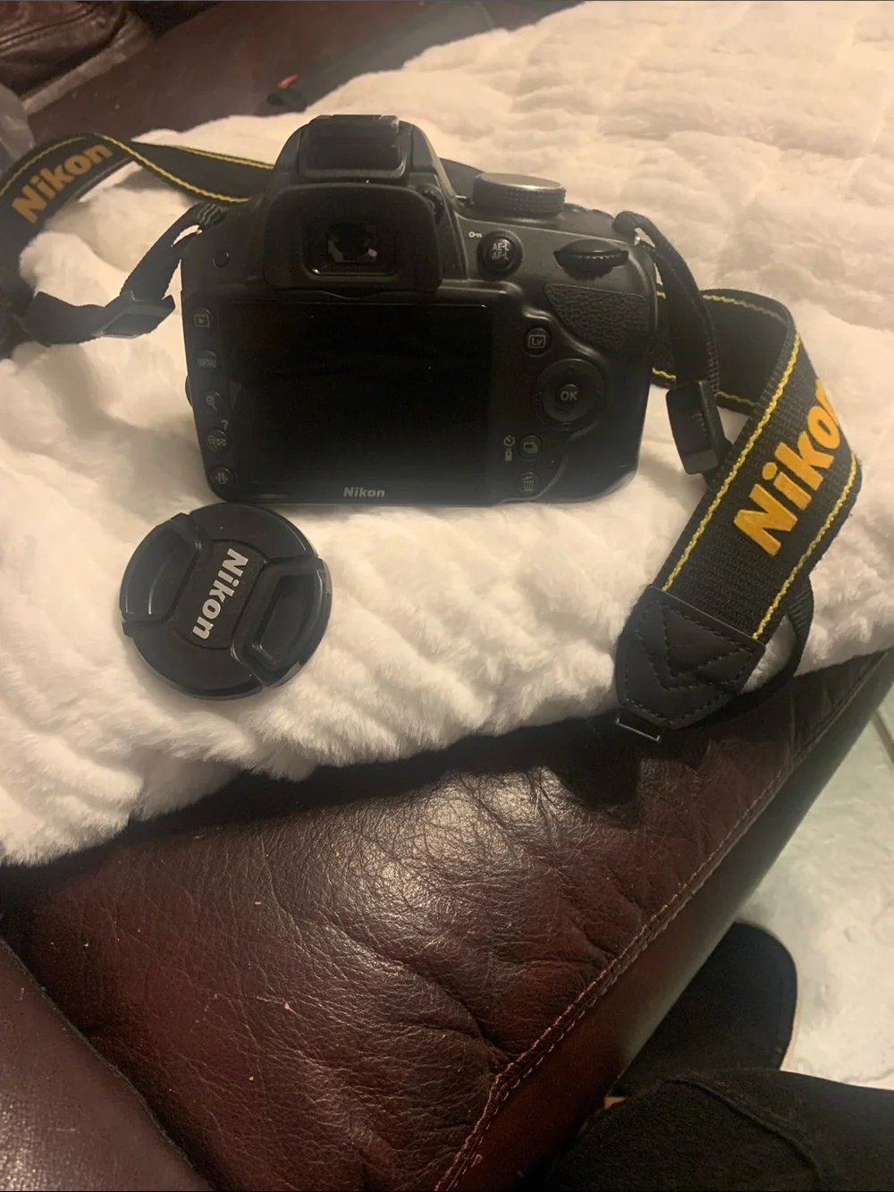 Nikon DSLR Camera in Black with Lens and Strap